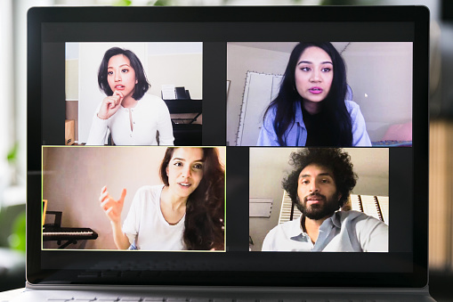 A group of young adult friends meet during a video chat