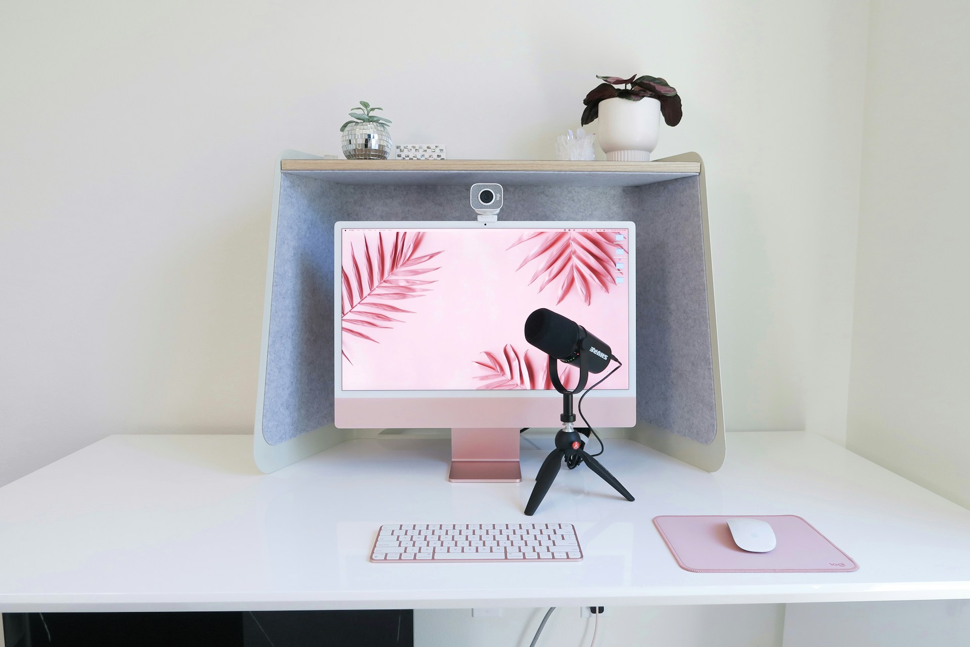 An iMac Desktop Computer Setup with Logitech Streamcam External USB Webcam and Shure MV7  Microphone